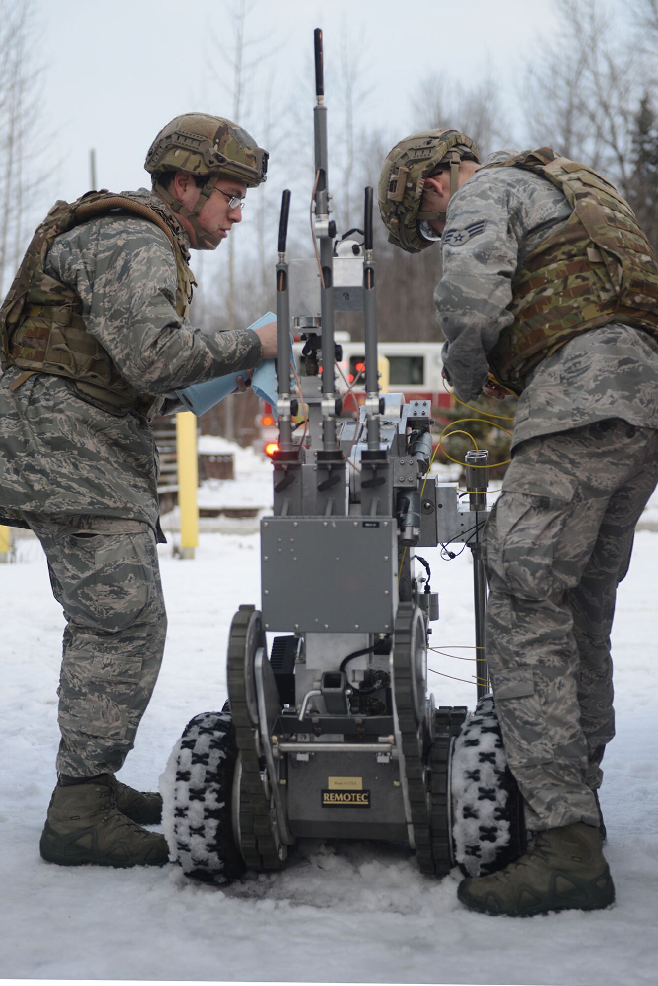 Airmen prepare an F6 robotic platform as part of a training exercise on Joint Base Elmendorf-Richardson, Jan. 27, 2016. The F6 has a wide range of capabilities for performing many types of explosive ordnance disposal missions. (U.S. Air Force photo by Airman 1st Class Javier Alvarez)