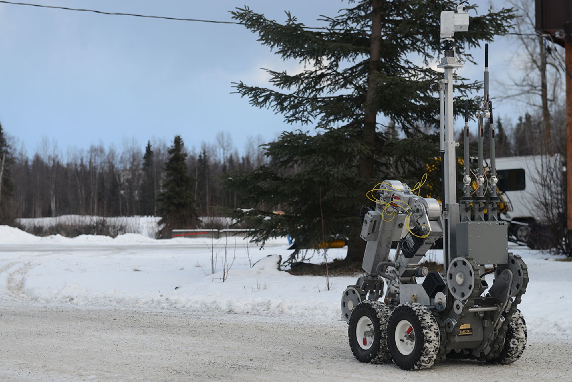 The F6 robotic platform maneuvers to examine an improvised explosive device as part of a training exercise on Joint Base Elmendorf-Richardson, Jan. 27, 2016. The use of robots gives explosive ordnance disposal technicians the ability to investigate explosive ordnance without getting in harms way. (U.S. Air Force photo by Airman 1st Class Javier Alvarez)