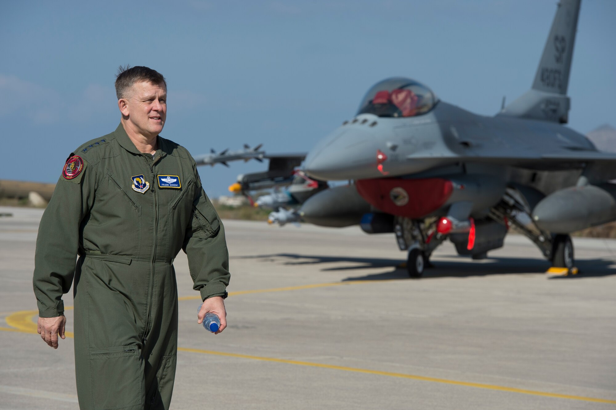 U.S. Air Forces in Europe and Air Forces Africa commander Gen. Frank Gorenc walks the flightline at Souda Bay, Greece, before a flying training mission Feb. 1. 2016. Gorenc, visited 480th Expeditionary Fighter Squadron Airmen to learn more about the bilateral training being conducted with the Hellenic air force. (U.S. Air Force photo by Staff Sgt. Christopher Ruano/Released)