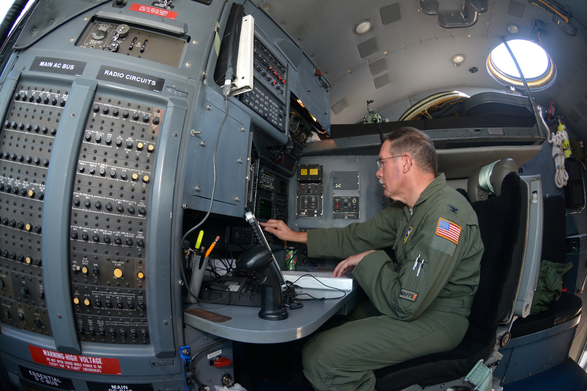 U.S. Air Force Col. Quincy “Newt” Huneycutt, III, Vice Wing commander and navigator for the 145th Airlift Wing, goes through his pre-flight checklist onboard a C-130 Hercules aircraft, at the North Carolina Air National Guard Base, Charlotte Douglas International Airport; December 10, 2015. Huneycutt, who has flown over 5,000 hours, is set to retire February 1, 2016 after serving more than 36 years in the NCANG. (U.S. Air National Guard photo by Master Sgt. Patricia F. Moran/Released)