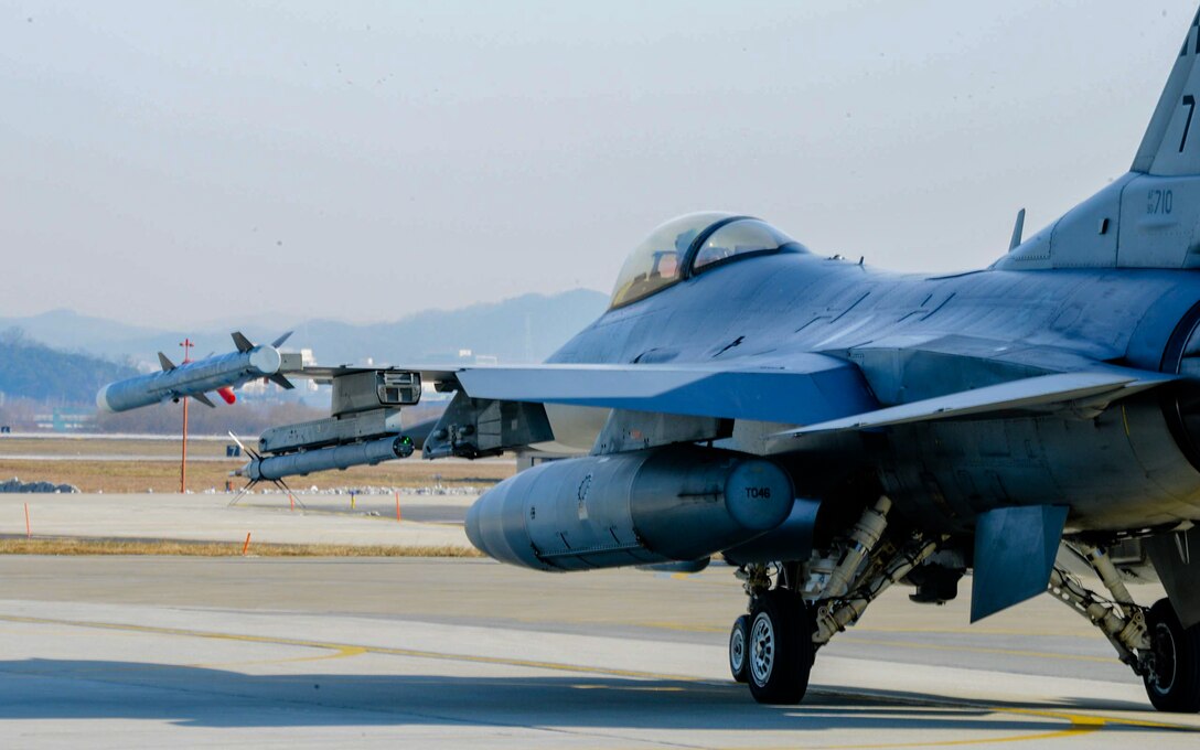 An F-16 Fighting Falcon from the 36th Flying Squadron taxis on the flightline before takeoff at Osan Air Base, Republic of Korea, Jan. 22, 2016. Pilots from the 36th FS teamed up with ROK air force F-15K Slam Eagles to deliver a joint airpower demonstration Jan. (U.S. Air Force photo by Airman 1st Class Dillian Bamman/Released)