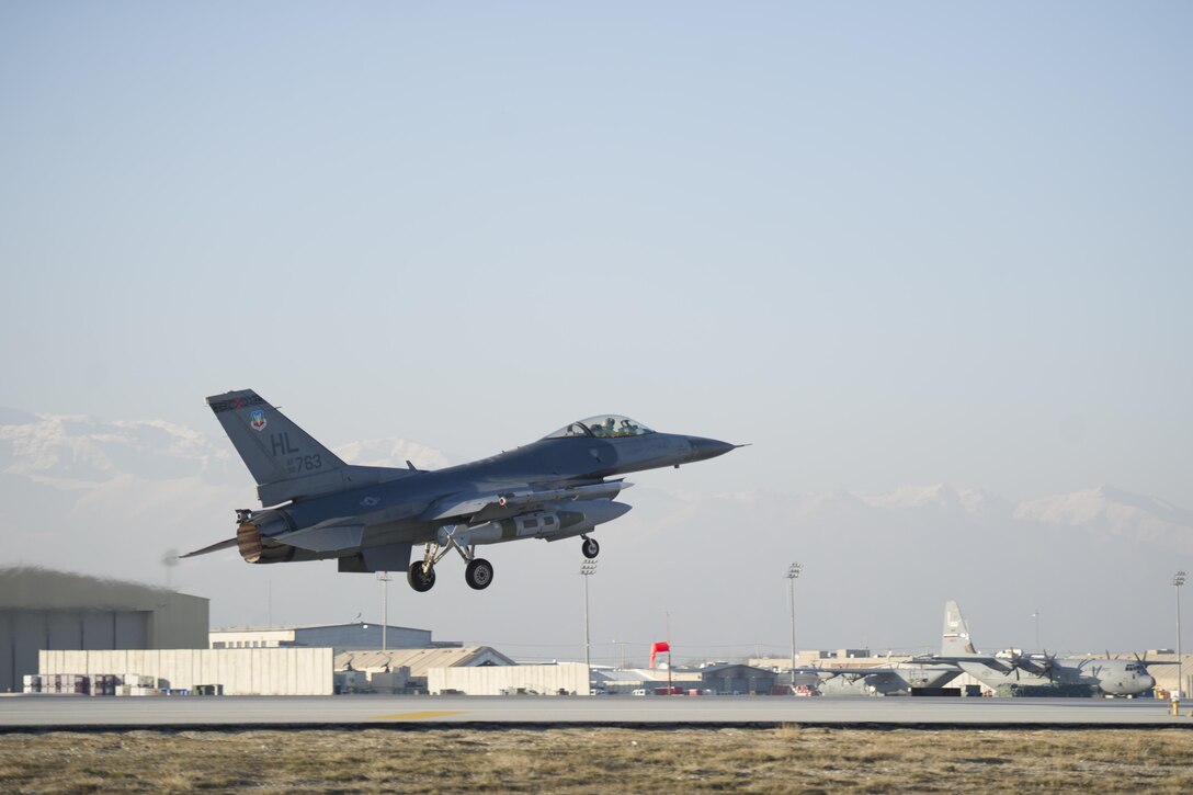 Air Force Capt. Brad Hunt takes off for a combat sortie in an F-16 Fighting Falcon aircraft on Bagram Airfield, Afghanistan, Feb. 1, 2016. Hunt is a pilot assigned to the 421st Expeditionary Fighter Squadron. Air Force photo by Tech. Sgt. Robert Cloys