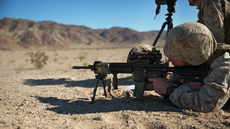 Corporal Jared Ingerson, rifleman, 3rd Battalion, 4th Marines, 7th Marine Regiment, fires his M27 Infantry Automatic Rifle at a target during the Designated Marksman Course’s culminating event at Range 113, Jan. 28, 2016. 