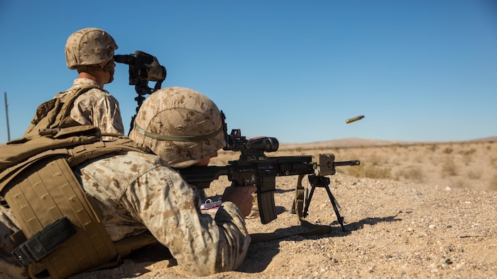 Pfc. Nathan Murdock, rifleman, 3rd Battalion, 7th Marine Regiment, fires his M27 Infantry Automatic Rifle at a target during the Designated Marksman Course’s culminating event at Range 113, Jan. 28, 2016. 