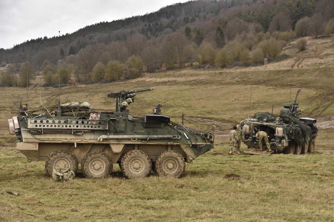 Soldiers conduct maintenance and general upkeep of their vehicles while awaiting orders for their next mission during the unit's participation in Allied Spirit IV in Hohenfels, Germany, Jan. 28, 2016. The soldiers are assigned to the Regimental Engineer Squadron, 2nd Cavalry Regiment. Army photo by Sgt. William A. Tanner