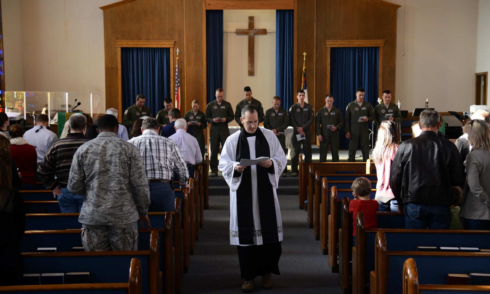 Chap. (Maj.) Richard Beyea, 47th Flying Training Wing chaplain, says a prayer at the Laughlin Chapel on Laughlin Air Force Base, Texas, Jan. 21, 2016. Laughlin’s students, families and community gathered as they celebrated Laughlin’s first-ever Blessing of the Wings ceremony. (U.S. Air Force photo by Senior Airman Ariel D. Partlow)