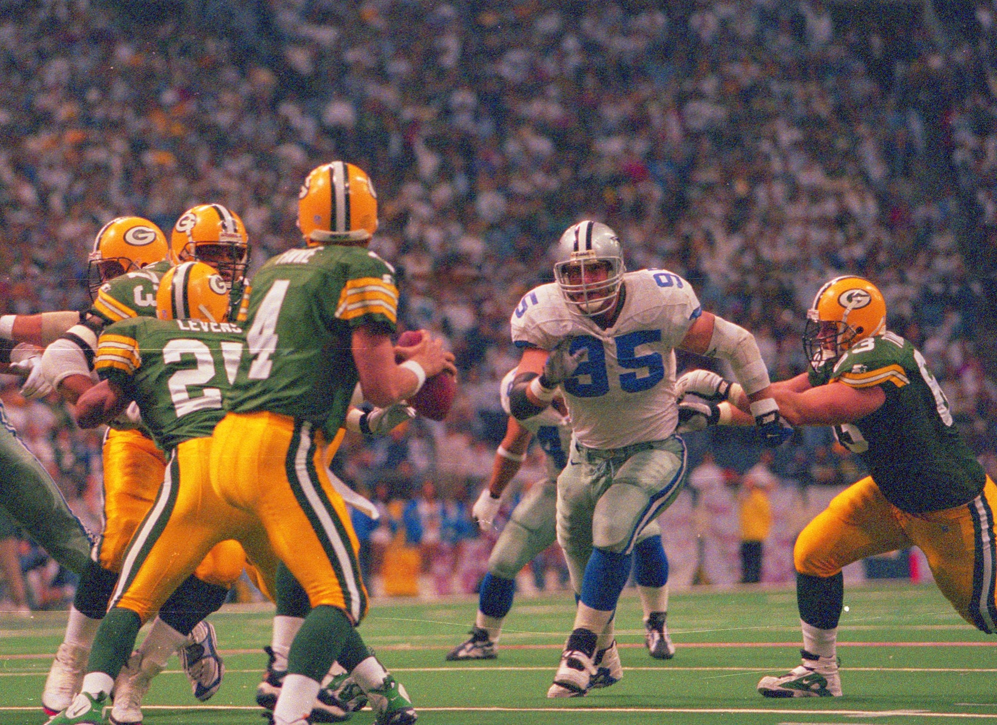 Chad Hennings, center right, played for the Dallas Cowboys for nine seasons. During that time he was part of three Super Bowl winning teams and played in 119 games, recording 27.5 sacks. Before his NFL career, Hennings graduated from the U.S. Air Force Academy in 1988 and went onto pilot training, where he would eventually fly 45 combat sorties over northern Iraq in an A-10 Thunderbolt II during two deployments spanning from 1991 and early 1992. (Photo courtesy/Dallas Cowboys)