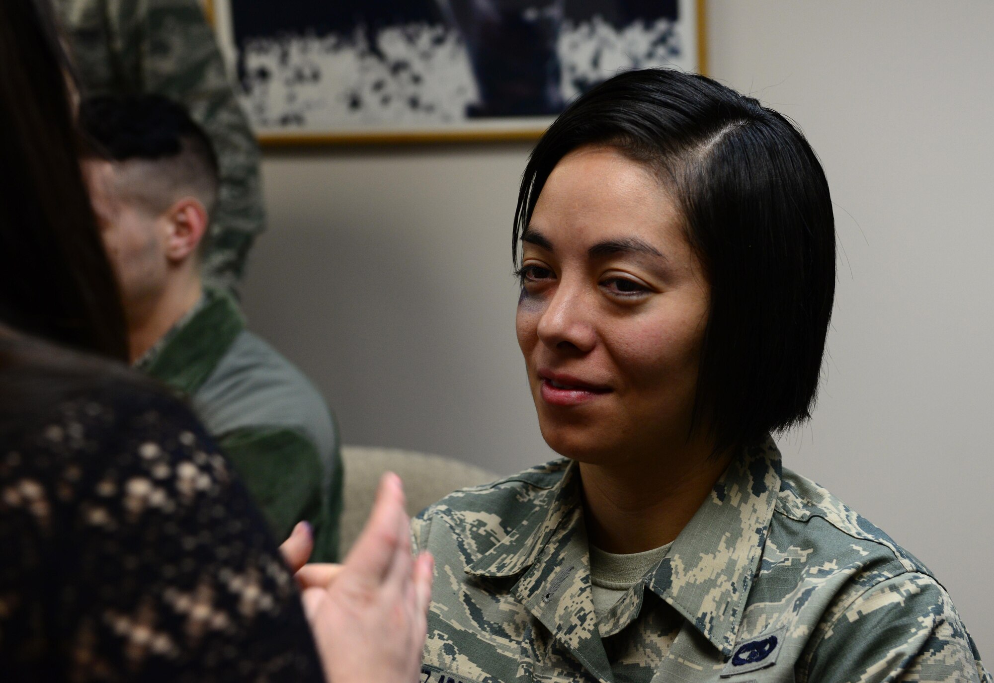Senior Airman Jazmin Gonzalaz-Araiza, 168th Wing vehicle management and analysis, gets the finishing color added to her fake injury Jan. 21, 2016, at Eielson Air Force Base, Alaska. Gonzalaz-Araiza and her wife both volunteered for the “Thanks for Asking” campaign to show domestic violence can happen with same-sex couples. (U.S. Air Force photo by Airman 1st Class Cassandra Whitman/Released)