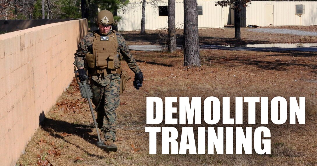 Staff Sgt. Chaz Carter, an Explosive Ordnance Disposal technician with EOD Company, 8th Engineer Support Battalion, searches the area during an improvised explosive device access training exercise aboard Camp Lejeune, N.C., Jan. 29, 2016. During the exercise, evaluators assessed Marines on safely locating and disposing of an IED while suppressing the full capabilities of the threat. (U.S. Marine Corps photo by Lance Cpl. Aaron K. Fiala/Released)