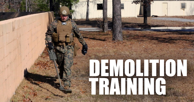 Staff Sgt. Chaz Carter, an Explosive Ordnance Disposal technician with EOD Company, 8th Engineer Support Battalion, searches the area during an improvised explosive device access training exercise aboard Camp Lejeune, N.C., Jan. 29, 2016. During the exercise, evaluators assessed Marines on safely locating and disposing of an IED while suppressing the full capabilities of the threat. (U.S. Marine Corps photo by Lance Cpl. Aaron K. Fiala/Released)