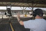 Miguel Martinez, 28th Maintenance Squadron aircraft mechanic, launches a T-38C Talon Sept. 3, 2015, at Joint Base San Antonio-Randolph. During a Continuous Process Improvement event, members of the 12th Flying Training Wing identified 13 possible ways to increase the number of sorties flown at JBSA-Randolph.(U.S. Air Force photo by Airman 1st Class Stormy Archer)