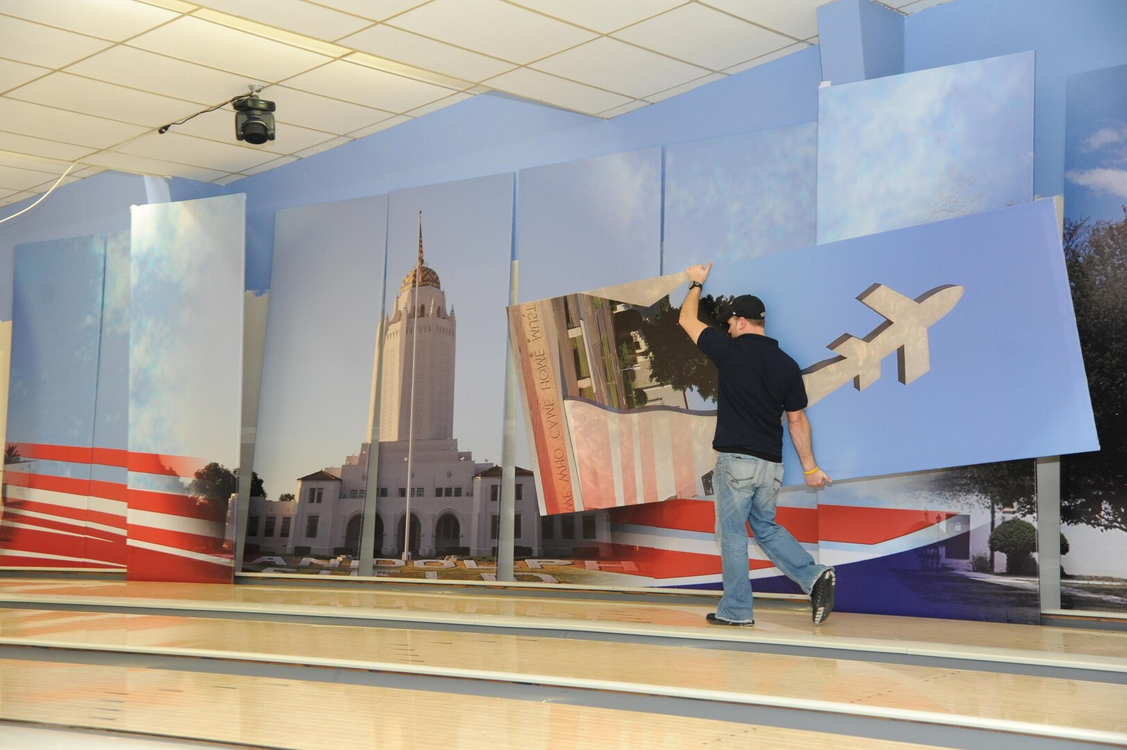 A builder pieces together a landscape mural of Joint Base San Antonio-Randolph Jan. 27 at the JBSA-Randolph Bowling Center. 