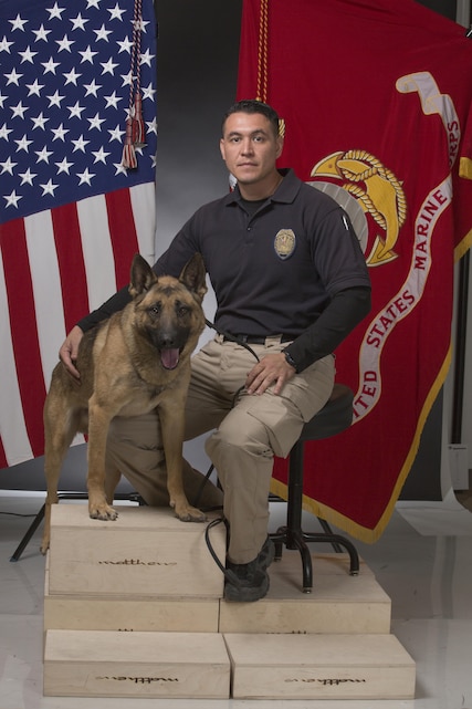Cpl. Navarrete, K-9 officer, and his K-9, Bady received the Meritorious Conduct Medal for the Inland Empire K-9 Association for their assistance in the Dec. 2 terrorist shooting in San Bernardino, Calif., during the association's dinner on Jan. 7. 