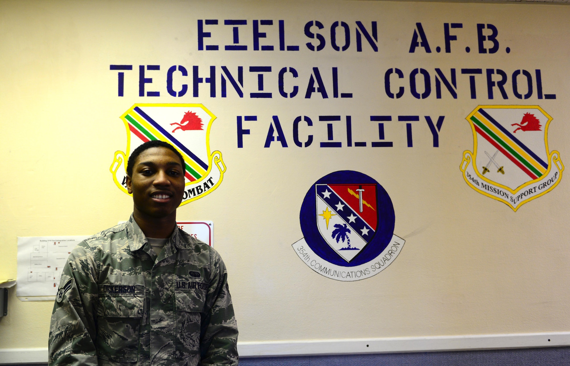 U.S. Air Force Airman 1st Class Angelo Dickerson, 354th Communications Squadron cyber transport systems technician, takes a quick break Jan. 27, 2016, at Eielson Air Force Base, Alaska. Dickerson said his proudest moment with the Iceman Team is when Colonel Michael Winkler, 354th Fighter Wing commander, called his parents to tell them what a great job he was doing at Eielson. (U.S. Air Force photo by Airman 1st Class Cassandra Whitman/Released)