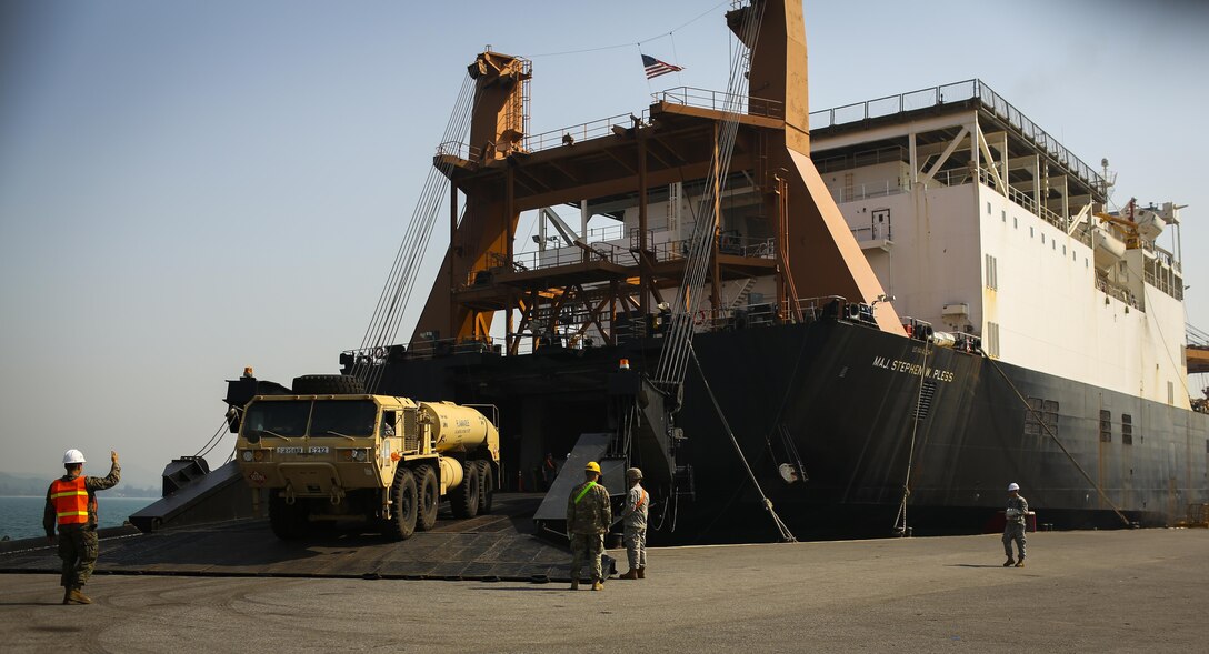 Royal Thai Navy and U.S. service members offload aircraft and ground vehicles from the USNS Maj. Stephen W. Pless, during exercise Cobra Gold 2016, at Sattahip Naval Base, Thailand, Jan. 28, 2016. Cobra Gold, in its 35th iteration, is an important element of the United States' and all other participating nations' regional military to military engagement efforts. 