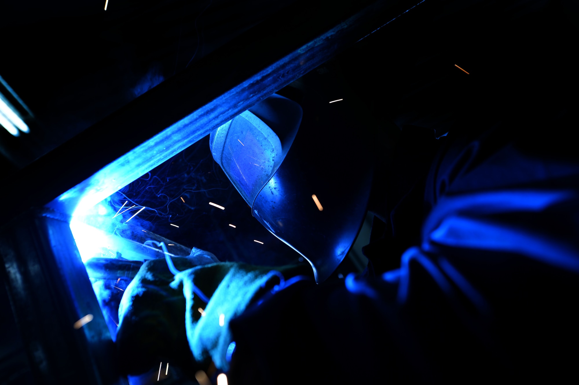 U.S. Air Force Senior Airman John Abbott, 20th Equipment Maintenance Squadron metals technology journeyman, welds a piece of metal at Shaw Air Force Base, S.C., Feb. 2, 2016. The 20th EMS metals technology flight uses their welding skillset to support the 76 F-16CM Fighting Falcons assigned to the 20th Fighter Wing. (U.S. Air Force photo by Senior Airman Michael Cossaboom)
