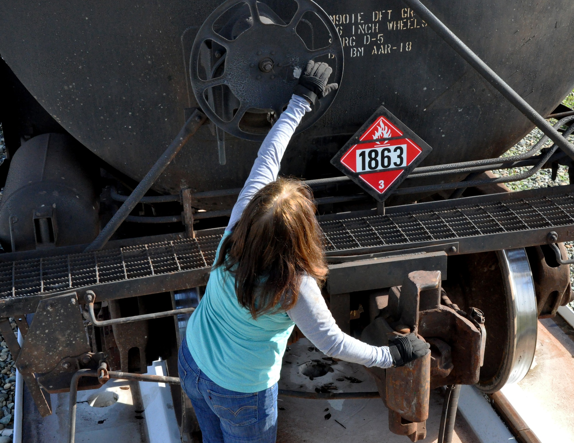 Sam Mertes, 9th Support Division locomotive engineer, disconnects a fuel car from the Beale train Jan. 20, 2016, at Beale Air Force Base, California. The train program primarily supports the U-2 Dragon Lady and processes jet fuel from Texas to ensure continuity of the flying mission. (U.S. Air Force photo by Staff Sgt. Jeffrey M.  Schultze)