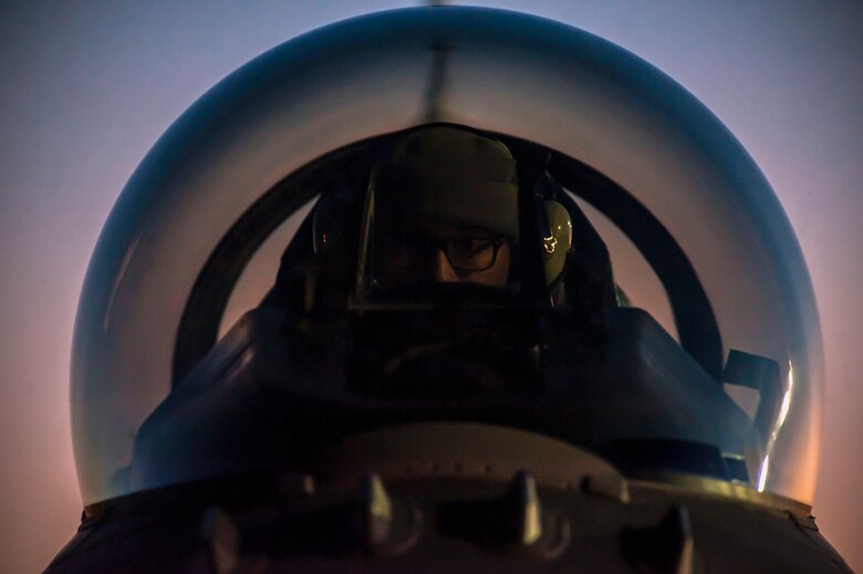 A maintainer assigned to the 169th Aircraft Maintenance Squadron, McEntire Joint National Guard Base, S.C.,  runs diagnostics inside an F-16 Fighting Falcon during Red Flag 16-1 at Nellis AFB, Nev., Feb. 2. Maintainers are here in support of their flying units during Red Flag to ensure the aircraft is capable of safely participating in the realistic combat training exercise. (U.S. Air Force photo by Airman 1st Class Rachel Loftis) 