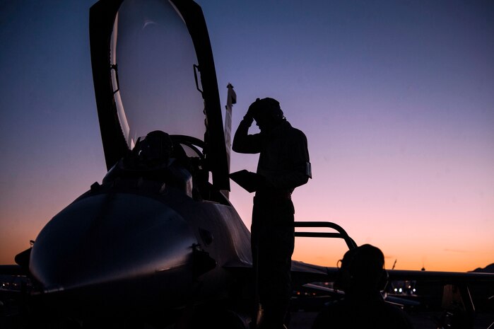 Maintainers assigned to the 169th Aircraft Maintenance Squadron, McEntire Joint National Guard Base, S.C., perform a diagnostics test on an F-16 Fighting Falcon during Red Flag 16-1 at Nellis AFB, Nev., Feb. 2. The maintainers were ensuring the hood of the aircraft was functioning correctly. Maintainers have the responsibility of ensuring their aircraft are ready for the daily joint and coalition Red Flag missions. (U.S. Air Force photo by Airman 1st Class Rachel Loftis)