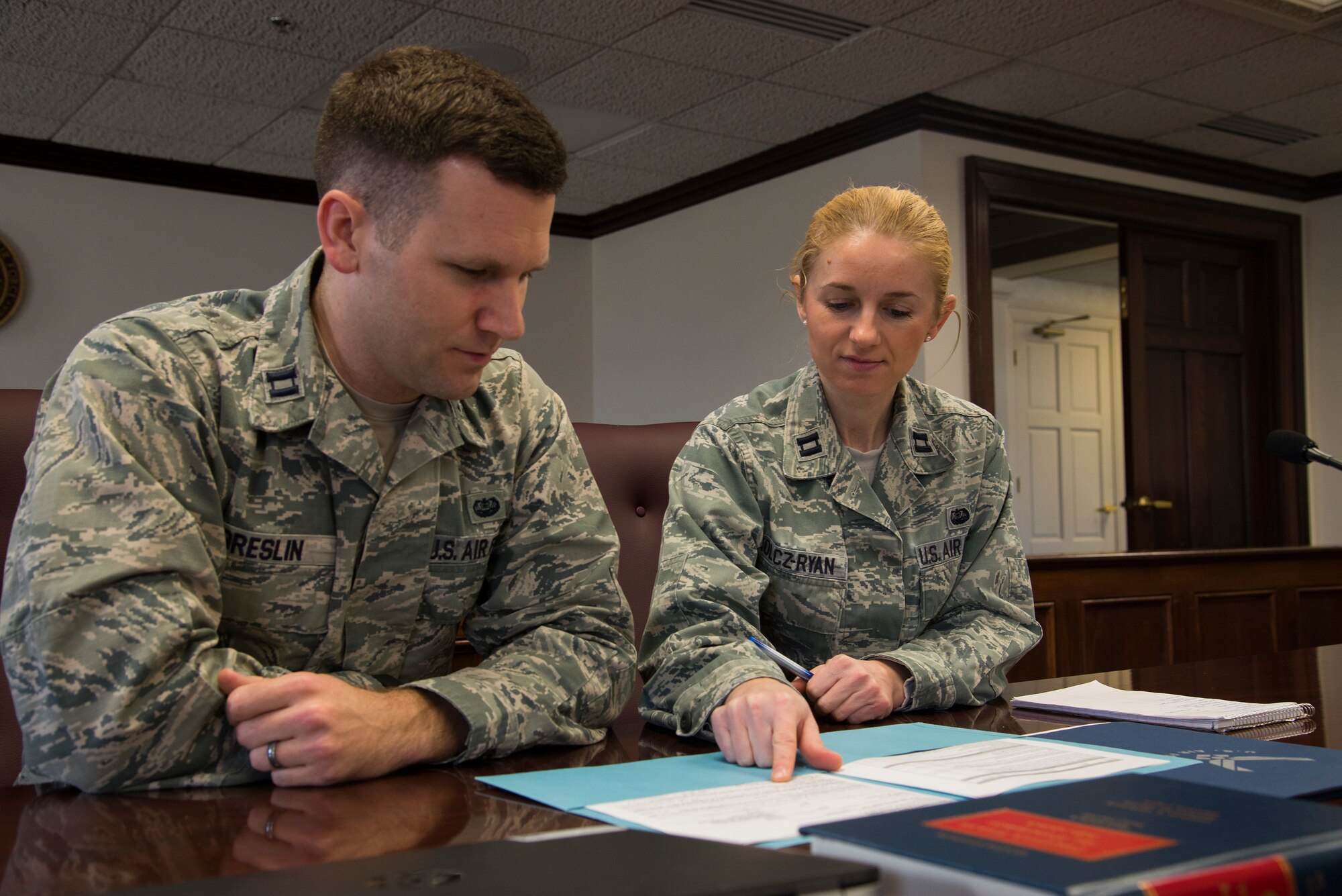 Capt. William Breslin and Capt. Marta Kolcz-Ryan were part of a Judge Advocate Symposium Jan. 29 at Scott. The JA symposium was held to inform and advise first sergeant and commanders of legal issues that may encounter. (U.S. Air Force photo/Airman Gwendalyn Smith)