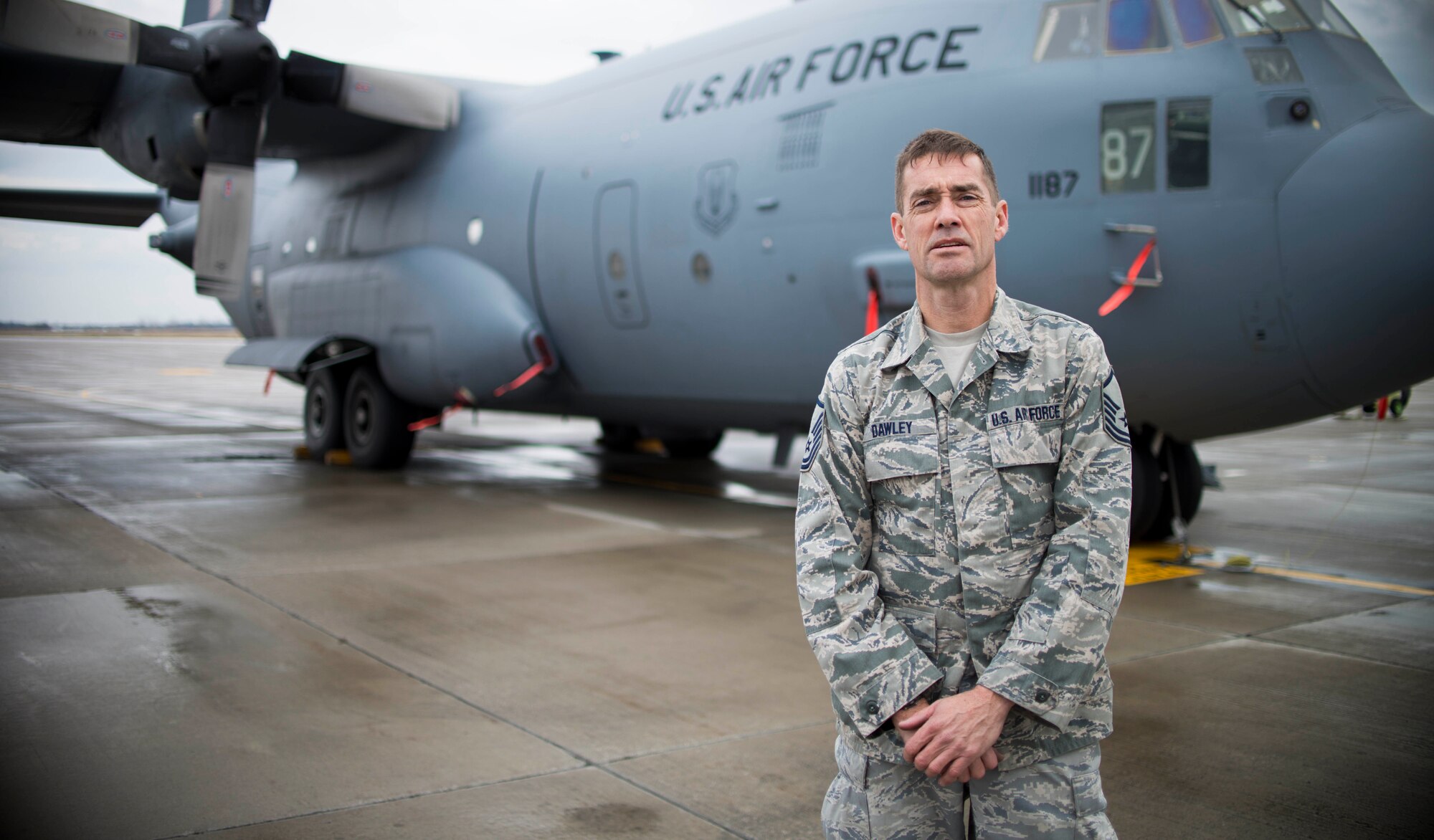 Master Sgt. Kenneth Dawley, crew chief, 914th Aircraft Maintenance Squadron, stands in front of a C-130H aircraft at Niagara Falls Air Reserve Station, January 9, 2016. Dawley has maintained these aircraft for 20 years. (U.S. Air Force photo by Tech. Sgt. Stephanie Sawyer) 