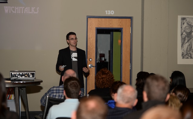 Senior Airman Kevin Falting, 22nd Aircraft Maintenance Squadron crewchief, speaks to a group of entrepreneurs during ‘Wichitalks’, Jan. 29, 2016, at The Labor Party in Wichita, Kan. Wichitalks is a TED Talk style grouping, where different people from around the community discuss and share ideas on how to make the community and city a better place to live. This was the first ever session. (U.S. Air Force photo/Senior Airman Colby L. Hardin)