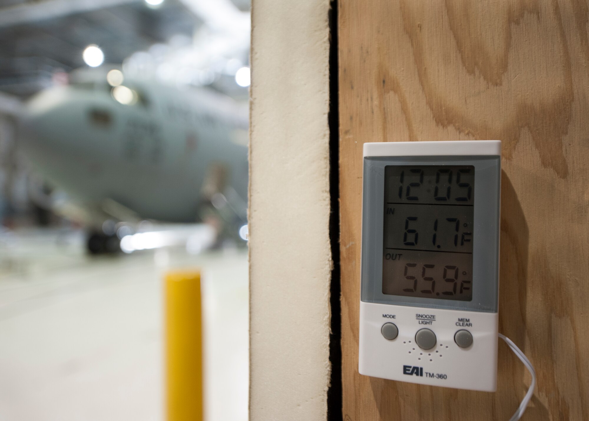 Staff Sgt. Casey Reed, 436th Civil Engineer Squadron, water and fuels systems maintenance removes a panel to show a fire suppression system inside a newly built insulation structure Feb. 2, 2016, inside Hangar 715 on Dover Air Force Base, Del. Five of these units were built around units inside this hangar. (U.S. Air Force photo/Senior Airman Zachary Cacicia)