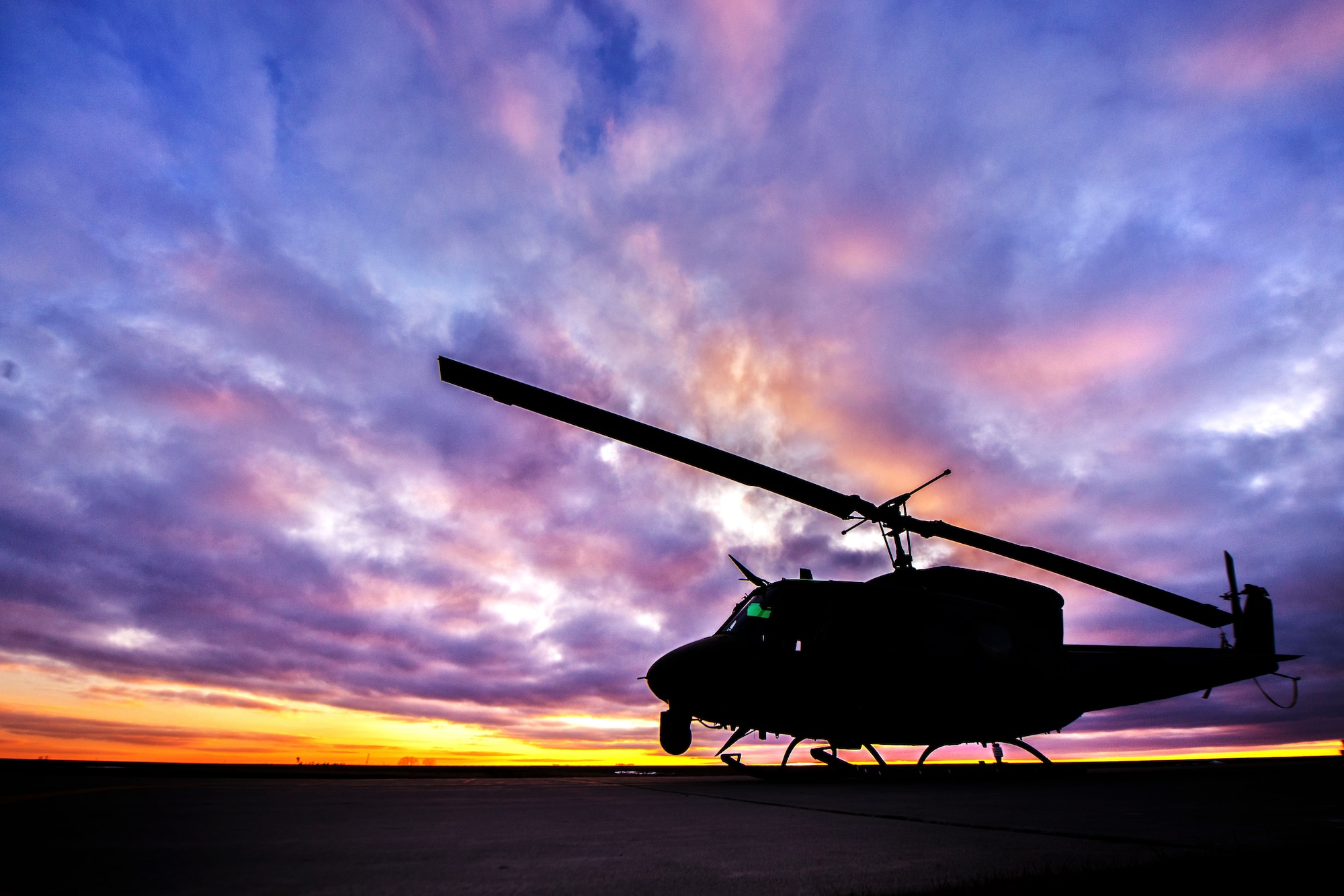 A UH-1N Iroquois from the 54th Helicopter Squadron sits on the helicopter pad at Minot Air Force Base, N.D., Feb. 2, 2016. Within Air Force Global Strike Command, the UH-1N supports the 90th Missile Wing, F.E. Warren AFB, W.Y., the 341st Missile Wing, Malmstrom AFB, M.T. and the 91st Missile Wing, Minot AFB, N.D. (U.S. Air Force photo/Airman 1st Class J.T. Armstrong)