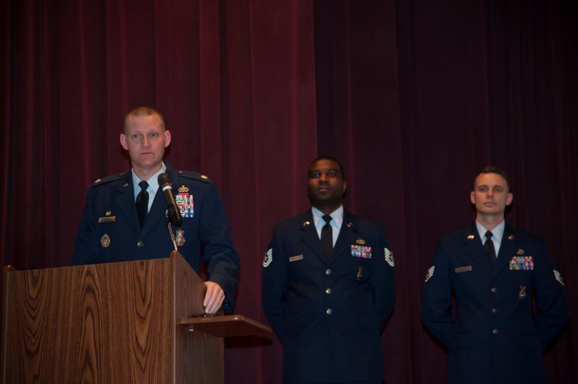 Lt. Col. Dustin Sutton, 5th Security Forces Squadron commander, speaks during Military Working Dog Kitty’s memorial service at Minot Air Force Base, N.D., Feb. 2, 2016. Kitty had been retired for a month when she died of an illness. (U.S. Air Force photo/Airman 1st Class Christian Sullivan)
