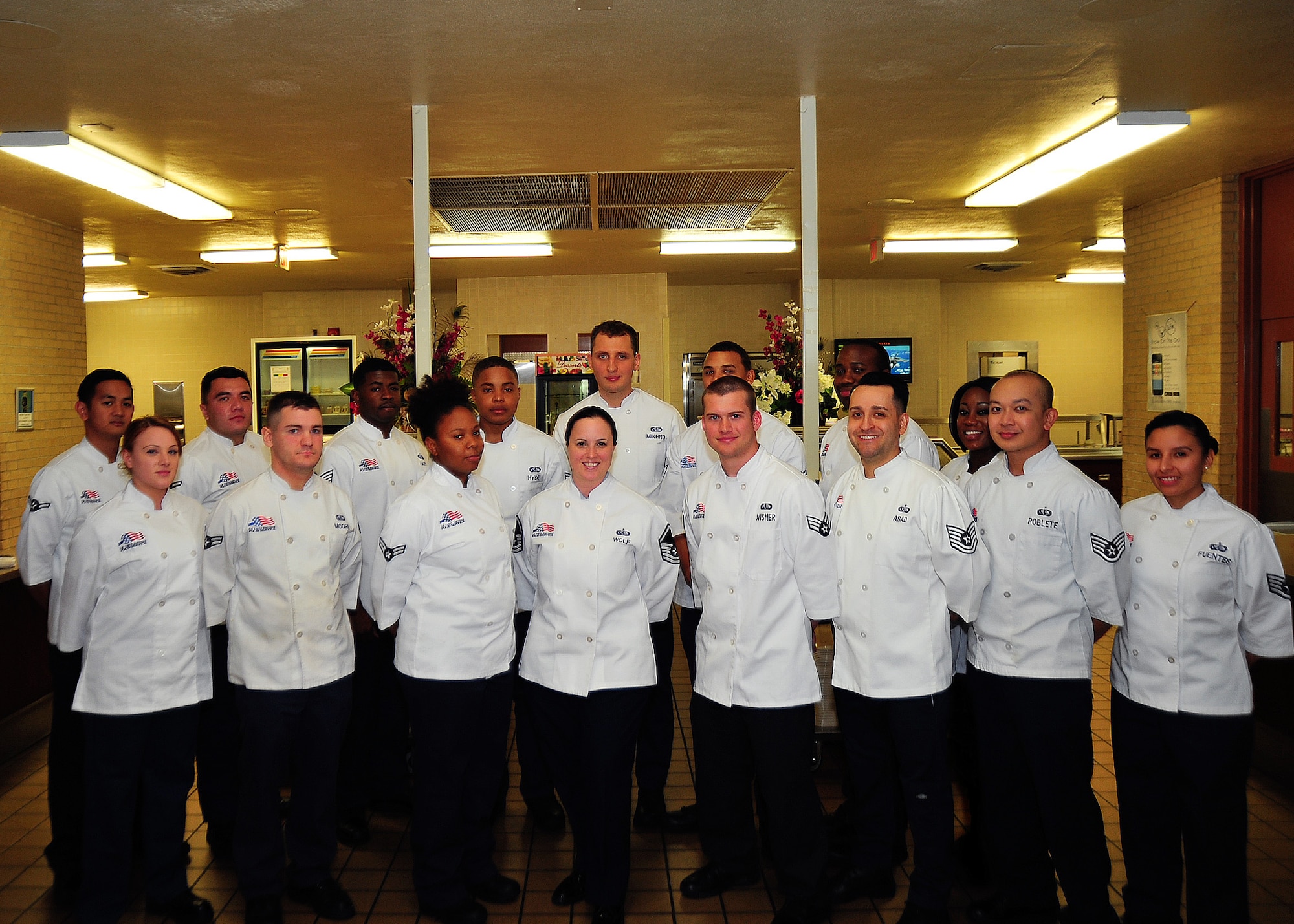 Members of the Tyndall Food Service team stand for a group photo Jan. 25 at the Berg-Liles Dining Facility. The team has been honored as the recipient for the 2015 John L. Hennessy Award for Excellence in Air Force Food Service Operations. (U.S. Air Force photo by Senior Airman Dustin Mullen/Released)