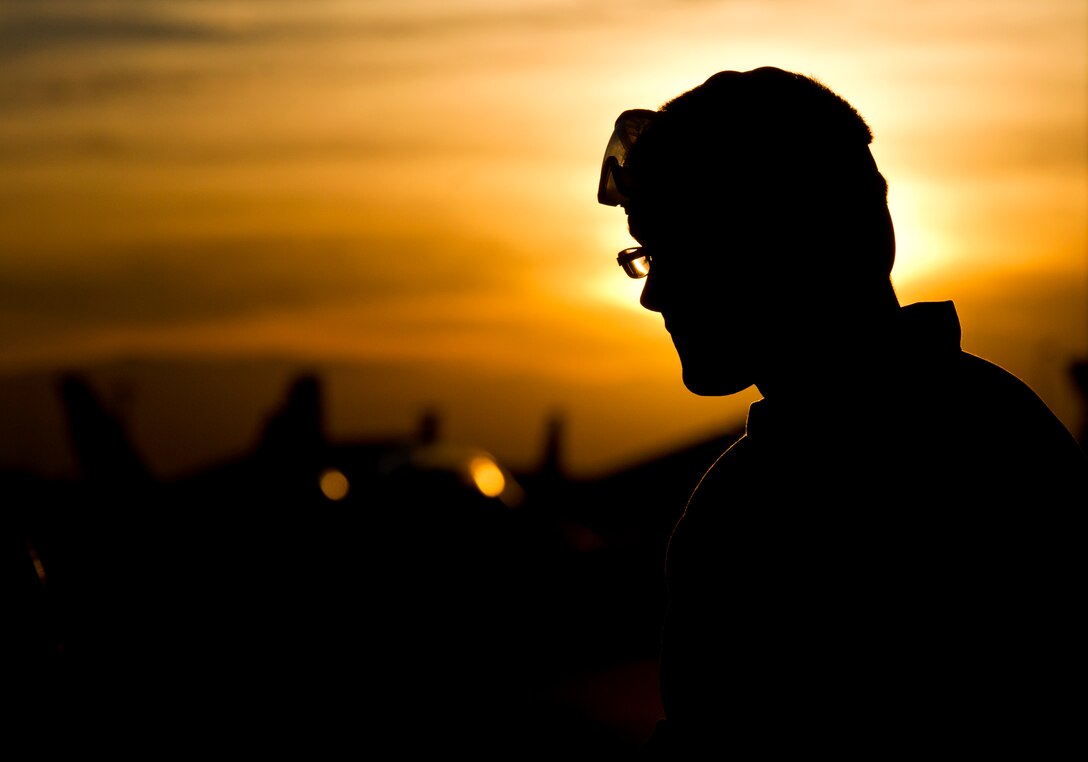 Senior Airman Steven Brinley, 95th Aircraft Maintenance Unit crew chief, Tyndall AFB, Fla., inspects an F-22 Raptor during Red Flag 16-1, Jan. 28, 2016 at Nellis AFB, Nev. Maintainers are the lifeblood of the flightline, and with almost 80 planes taking off twice daily during Red Flag, it is their duty to ensure mission-essential aircraft leave and return safely. (U.S. Air Force photo by Senior Airman Alex Fox Echols III/Released)