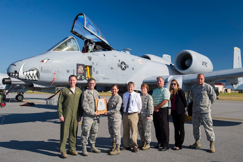 The 442nd Fighter Wing, from Whiteman Air Force Base, Mo., presents a plaque of appreciation to Col. Shawn Fairhurst, 45th Space Wing vice commander, and members of the 45th SW Feb. 1, 2016, at Patrick Air Force Base, Fla. The 442nd FW deployed to Patrick AFB to conduct combat, search and rescue training. (U.S. Air Force photo by Matthew Jurgens/Released)