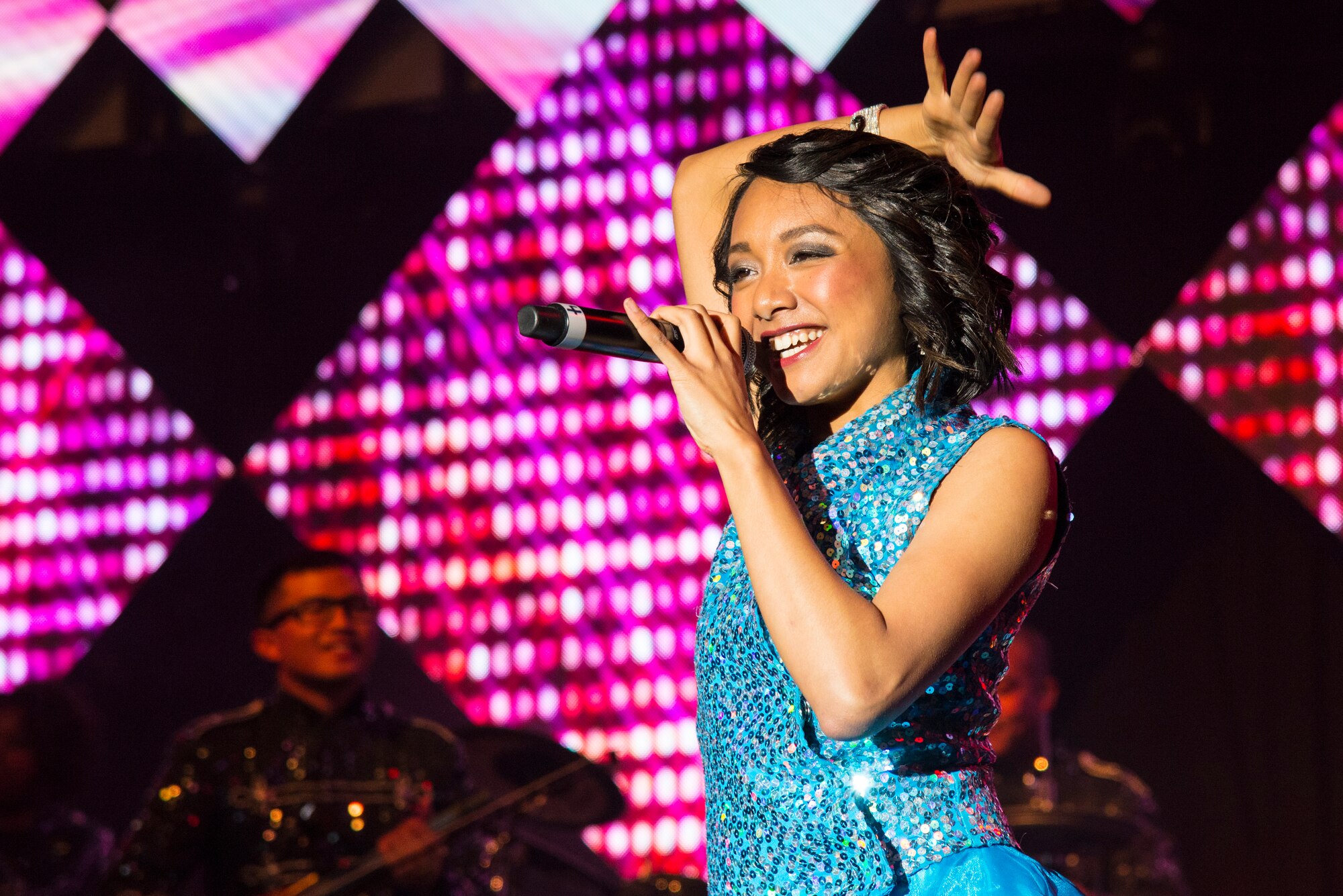 Senior Airman Christine David, 96th Aircraft Maintenance Squadron, performs during the last Tops in Blue concert Jan. 15.  David joined the troupe in March of last year.  (U.S. Air Force photo/ Senior Airman Tristin English)