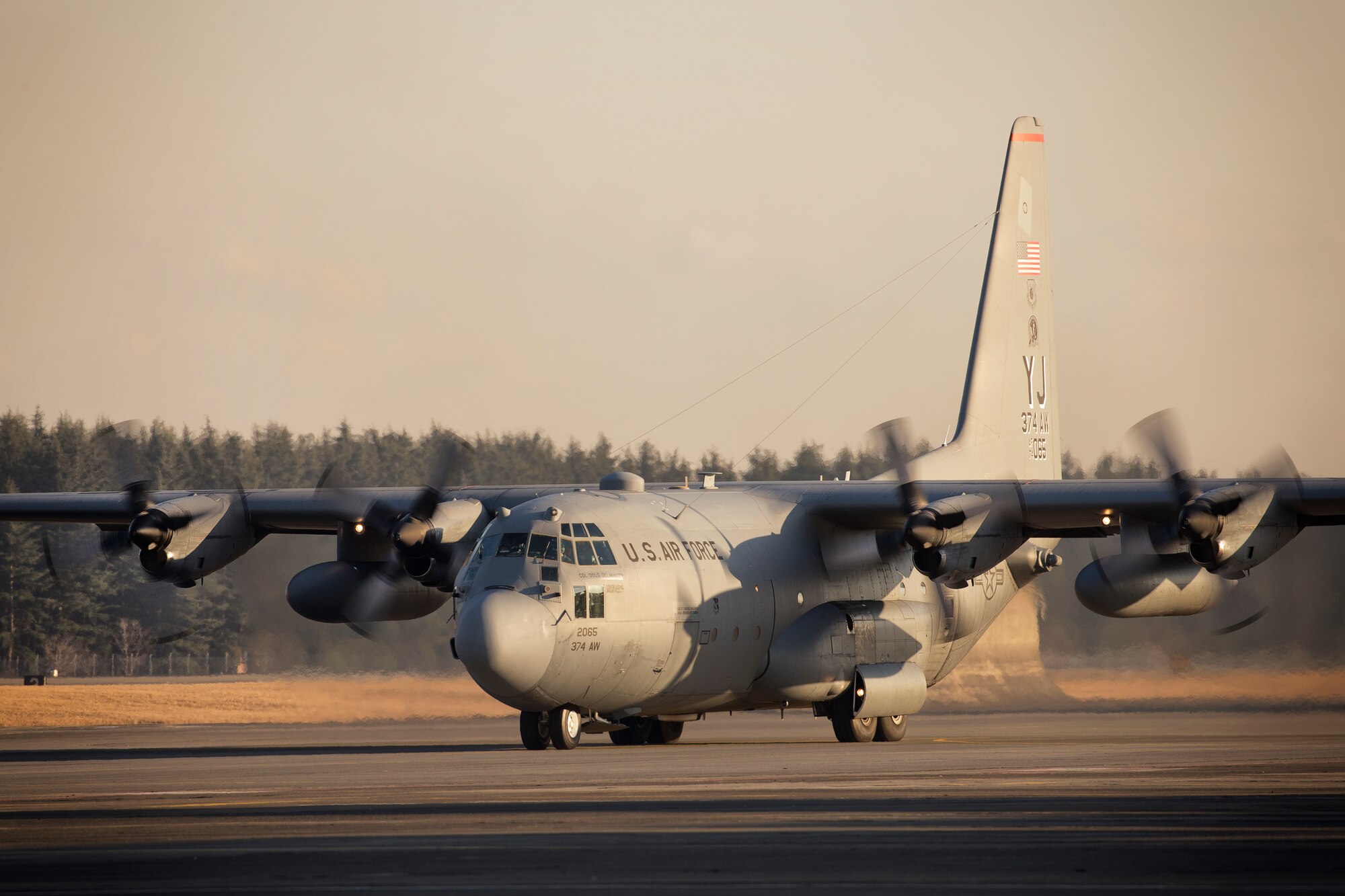 A C-130 Hercules assigned to the 36th Airlift Squadron taxis down the runway at Yokota Air Base, Japan, Jan. 26, 2016. The 36 AS regularly conducts training missions to remain proficient in the necessary skills to support any contingency. (U.S. Air Force photo by Osakabe Yasuo/Released)