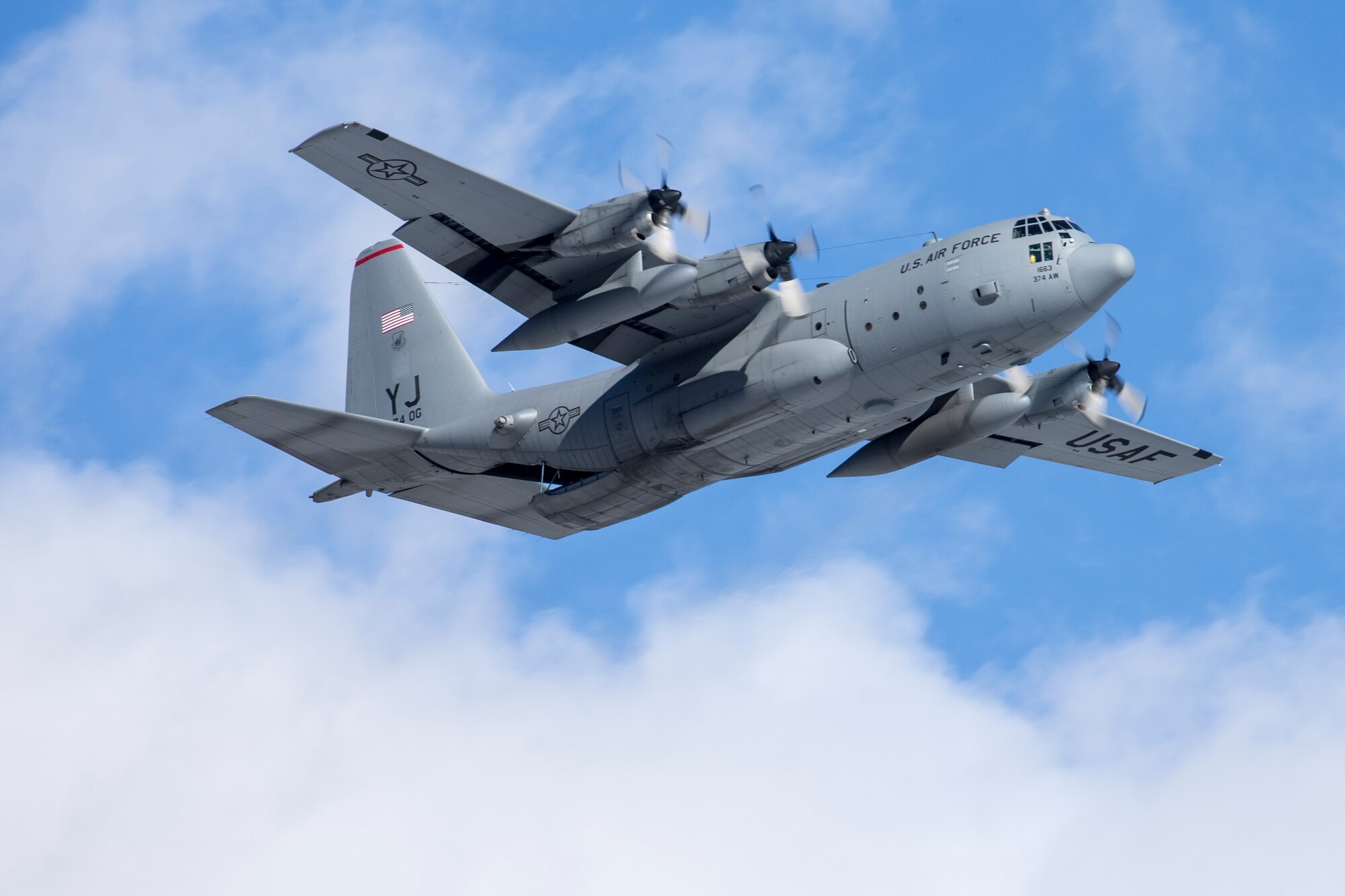 A C-130 Hercules assigned to the 36th Airlift Squadron is ready to perform a low-cast, low-altitude airdrop at Yokota Air Base, Japan, Jan. 20, 2016. The LCLA airdrops are a special container delivery system, designed to be used and discarded rather than turned in and reused. During Operation Christmas Drop 2015, 36 AS Airmen delivered 40,000 pounds of supplies to the islands in Micronesia. (U.S. Air Force photo by Osakabe Yasuo/Released) 