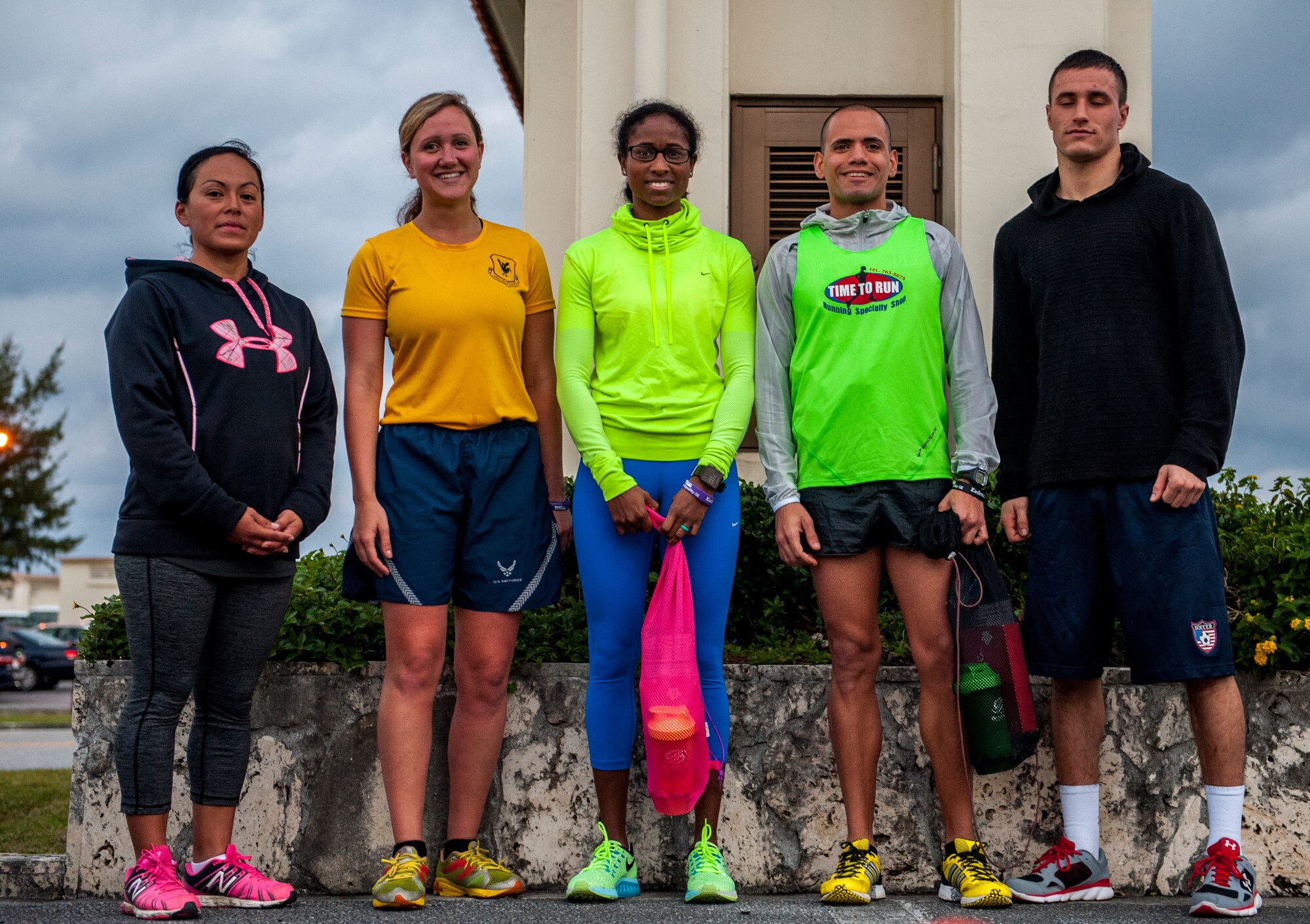 Staff Sgt. Christina Paecht, Capt. Allison Barbo, 1st Sgt. Jessica Wells, Airman 1st Class Samuel Ramos, and Airman 1st Class Kevin St. George, the top three female and top two male finishers of the “Race for Equality” 5K, Feb. 3, 2016, at Kadena Air Base, Japan. More than 300 participants ran in the 5K, which kicked off the 18th Wing’s African American Observance Month. (U.S. Air Force photo by Airman 1st Class Nick Emerick)