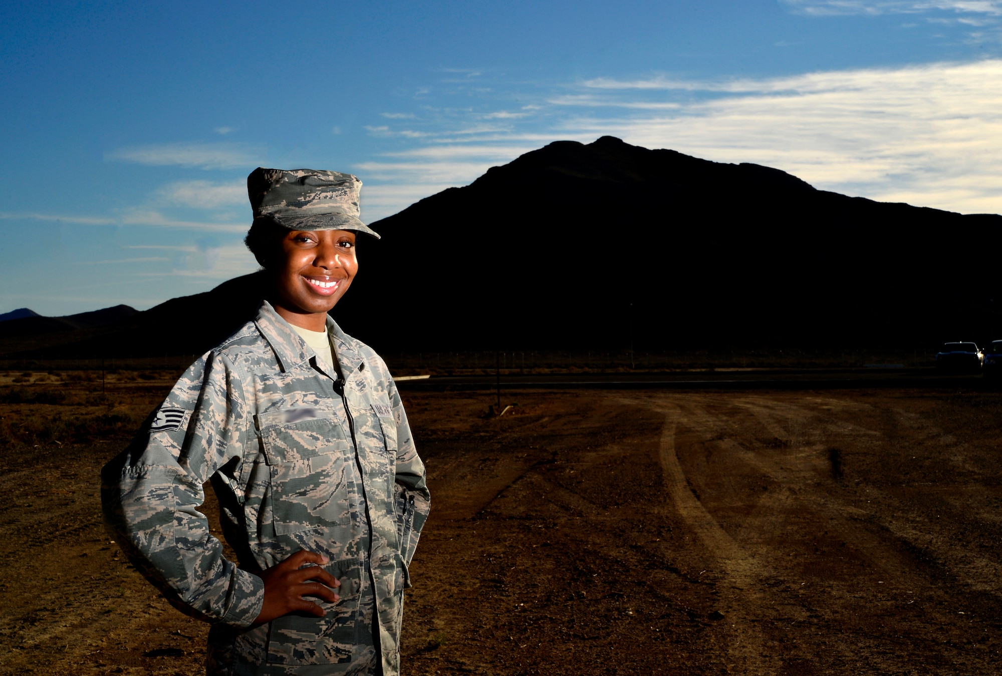 Then Staff Sgt. Latoya, 30th Reconnaissance Squadron links manager, poses for a photo Oct. 26, 2015, at Creech Air Force Base, Nevada. Latoya was recently promoted to Technical Sergeant under the Stripes for Exceptional Performers program due to her strong work ethic and moral compass. (U.S. Air Force Photo by Airman 1st Class Kristan Campbell/Released)
