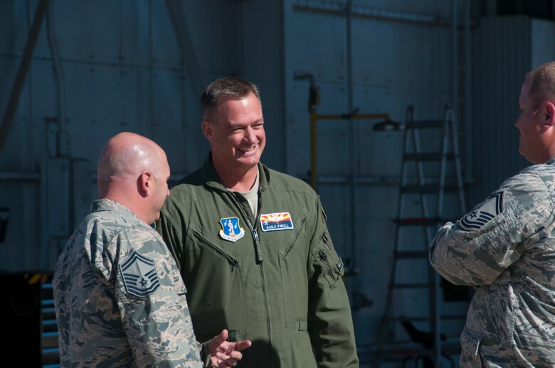 Lt. Col. Christopher O’Neil former commander of the Arizona Air National Guard’s 162nd Wing Aerospace Control Alert detachment located at Davis-Monthan Air Force Base talks with Senior Master Sgts. Jay Watkins and Joe Allred prior to the Air Force Outstanding Unit Award presentation.  The AFOUA was given for outstanding performance during the period of Nov. 1, 2012 through Oct. 31, 2014. (U.S. Air National Guard photo by 2d Lt. Lacey Roberts)