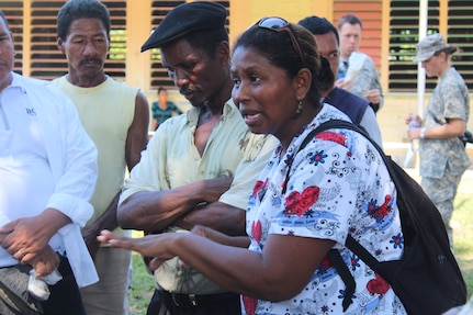 Candida Derek Jackson, Nueva Jerusalén Municipal Health Director, Gracias a Dios, where Nueva Jerusalén is located, speaks to the people in native Miskito language, to explain the kinds of services provided and the procedures to follow, during a Medical Readiness Training Exercise, January 28, 2016. This joint effort between U.S. service members and Honduran health representatives will aid communities in the remote area that is lacking proper health care facilities and medications. (U.S. Army photo by Maria Pinel/Released)