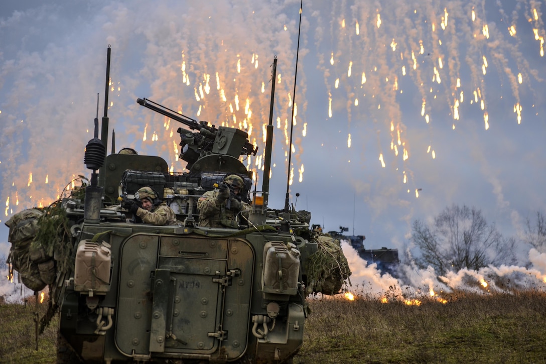 Soldiers attack simulated enemy combatants during exercise Allied Spirit IV at the U.S. Army’s Joint Multinational Readiness Center on Hohenfels Training Area, Germany, Feb. 2, 2016. The multinational exercise aims to improve tactical interoperability and communications between NATO members and partner nations. The soldiers are assigned to 2nd Squadron, 2nd Cavalry Regiment. Army photo by Pvt. Randy Wren
