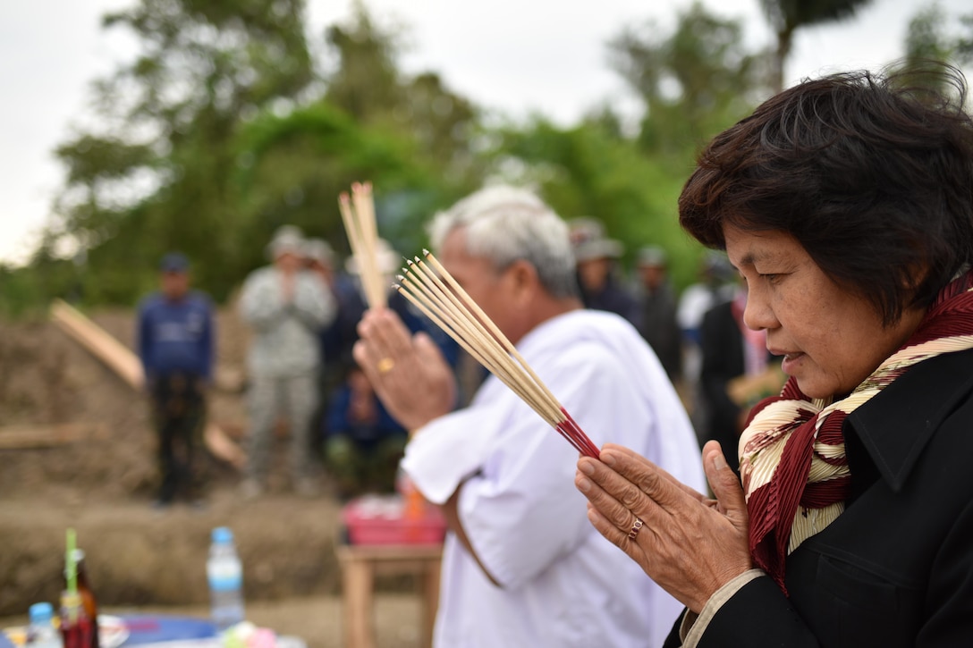 Samai Tanapai Bul (left) and Upin Tain Chumpun (right), school director, bless a pillar at the Wuat Ban Mak school, during exercise Cobra Gold 2016, Saraburi, Thailand, Jan. 25, 2016. Cobra Gold, in its 35th iteration, focuses on humanitarian civic action, community engagement, and medical activities to support the needs and humanitarian interest of civilian populations around the region.