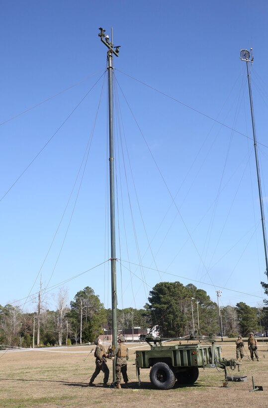 Marines with Headquarters Company, Combat Logistics Regiment 25, conduct a maintenance check on an antenna during a command post exercise at Camp Lejeune, N.C., Feb. 2, 2016. The mission of 2nd Marine Logistics Group is to provide general support combat logistics to all forces operating in the II Marine Expeditionary Force battlespace. (U.S. Marine Corps photo by Cpl. Paul S. Martinez/Released)