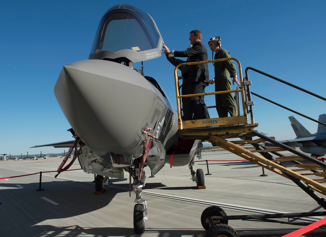 Defense Secretary Ash Carter looks into the cockpit of a F-35B on Marine Corps Air Station Miramar, Calif., Feb. 3, 2016. Carter is meeting this week with troops and members of the defense community to preview the proposed fiscal year 2017 defense budget. DoD photo by Navy Petty Officer 1st Class Tim D. Godbee