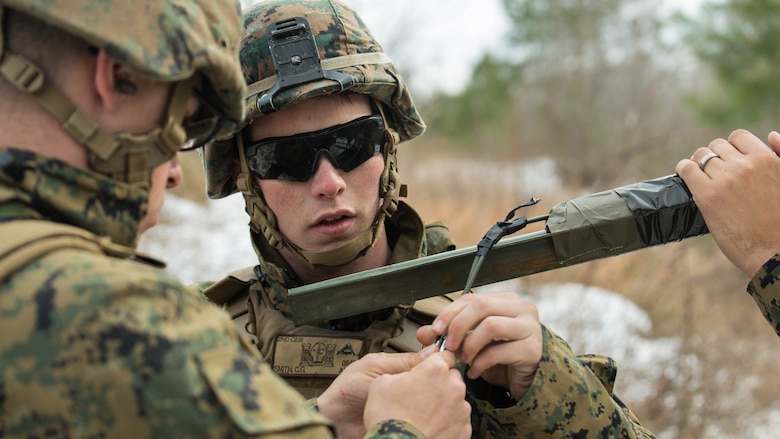 Lance Cpl. Colin Smith, a combat engineer with 2nd Combat Engineer Battalion, replaces blasting caps on an improvised Bangalore during a Deployment for Training exercise at Fort A.P. Hill, Va., Jan. 28, 2016. Marines utilized the larger ranges Fort A.P. Hill offers to gain a more realistic combat training experience before deploying to Okinawa, Japan. 