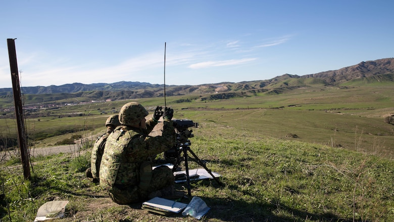 Japan Ground Self-Defense Force Forward Observers, call out targets to their mortar teams during an Exercise Iron Fist 2016 training event, aboard Marine Corps Base Camp Pendleton, Calif., Feb. 1, 2016 Exercise Iron Fist is the largest bilateral exercise conducted by I Marine Expeditionary Force and is aimed at improving the combined amphibious operation capabilities of the U.S. and Japan. 