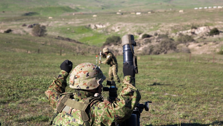 A Japan Ground Self-Defense Force mortar team adjusts their targeting stakes during a live-fire mortar range, during Exercise Iron Fist 2016, aboard Marine Corps Base Camp Pendleton, Calif., Feb 1, 2016. As a part of Exercise Iron Fist, this training was conducted to prepare the JGSDF soldiers for more advanced, bilateral combined arms training aboard Marine Corps Air-Ground Combat Center Twentynine Palms later in the month. 