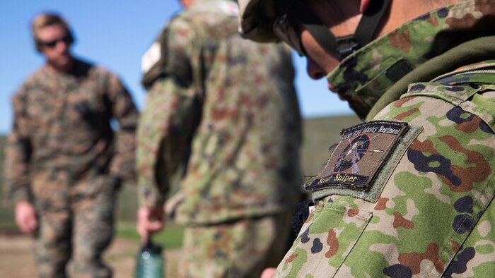 A soldier of the Japan Ground Self-Defense Force, Western Army Infantry Regiment’s Scout Sniper program takes notes as U. S. Marine Corps scout sniper instructors review the team’s performance in the break contact evolution of an abbreviated scout sniper course held during Exercise Iron Fist 2016 on Marine Corps Base Camp Pendleton, Calif., Feb. 1, 2016. Iron Fist affords the Marines and JGSDF soldiers the opportunity to share their experience and knowledge and increase camaraderie between the two organizations.