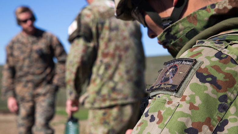 A soldier of the Japan Ground Self-Defense Force, Western Army Infantry Regiment’s Scout Sniper program takes notes as U. S. Marine Corps scout sniper instructors review the team’s performance in the break contact evolution of an abbreviated scout sniper course held during Exercise Iron Fist 2016 on Marine Corps Base Camp Pendleton, Calif., Feb. 1, 2016. Iron Fist affords the Marines and JGSDF soldiers the opportunity to share their experience and knowledge and increase camaraderie between the two organizations.