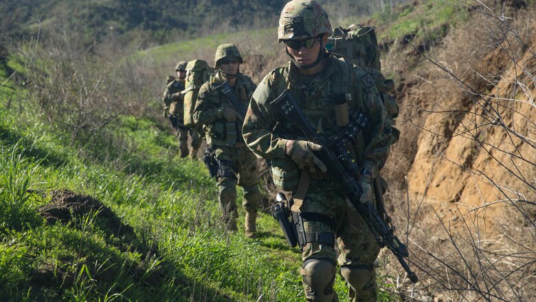 Sergeant 1st Class Takashi Kuriyama of the Japan Ground Self-Defense Force’s Western Army Infantry Regiment Scout Sniper Program leads fellow soldiers on patrol while conducting break contact drills during an abbreviated scout sniper course, instructed by Marine Corps Scout Sniper instructors, during Exercise Iron Fist on Marine Corps Base Camp Pendleton, Calif., Feb. 1, 2016. During break contact drills the team moves to a location where the enemy cannot observe and fire upon them as they typically operate in small teams with limited firepower and ammunition. 