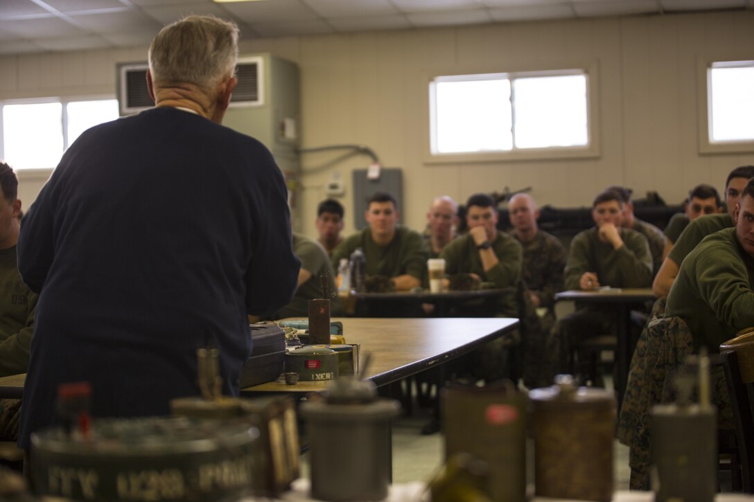 Vietnam veteran and retired Marine major, John Fasulo, gives a class to Marines with 3rd Battalion, 2nd Marine Regiment, during a Deployment for Training exercise at Fort A.P. Hill, Va., Jan. 29, 2016. The class covered the nomenclature and effectiveness of multiple land mines used in combat throughout history. He also shared his Vietnam War experiences to showcase the importance of understanding different weapon systems before the Marines deploy to an overseas environment. (U.S. Marine Corps photo by Lance Cpl. Samuel Guerra/Released)
